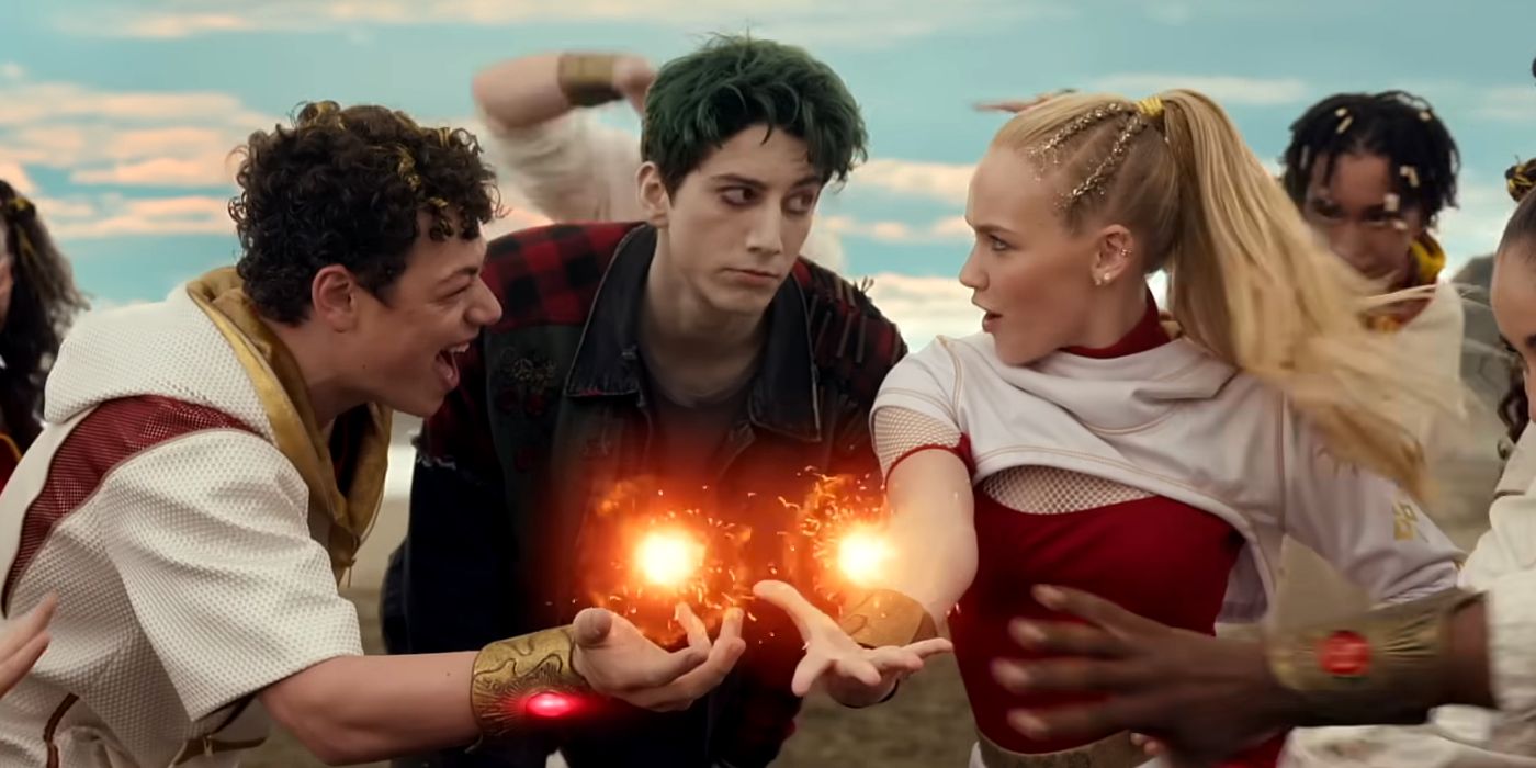 Nova and Ray creating fireballs while Zed looks on in Zombies 4 Dawn of the Vampires
