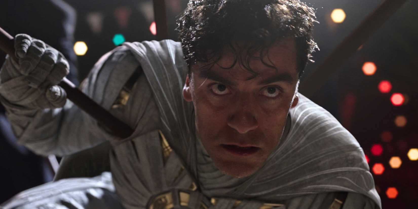 Oscar Isaac in mid-fight as Moon Knight