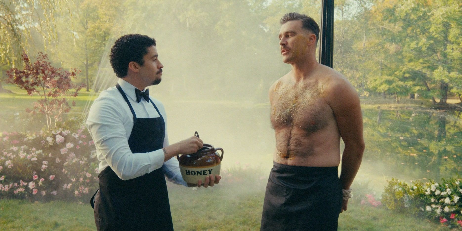 Bad Bunny as Oscar putting honey on his boss Travis Kelce in Happy Gilmore 2