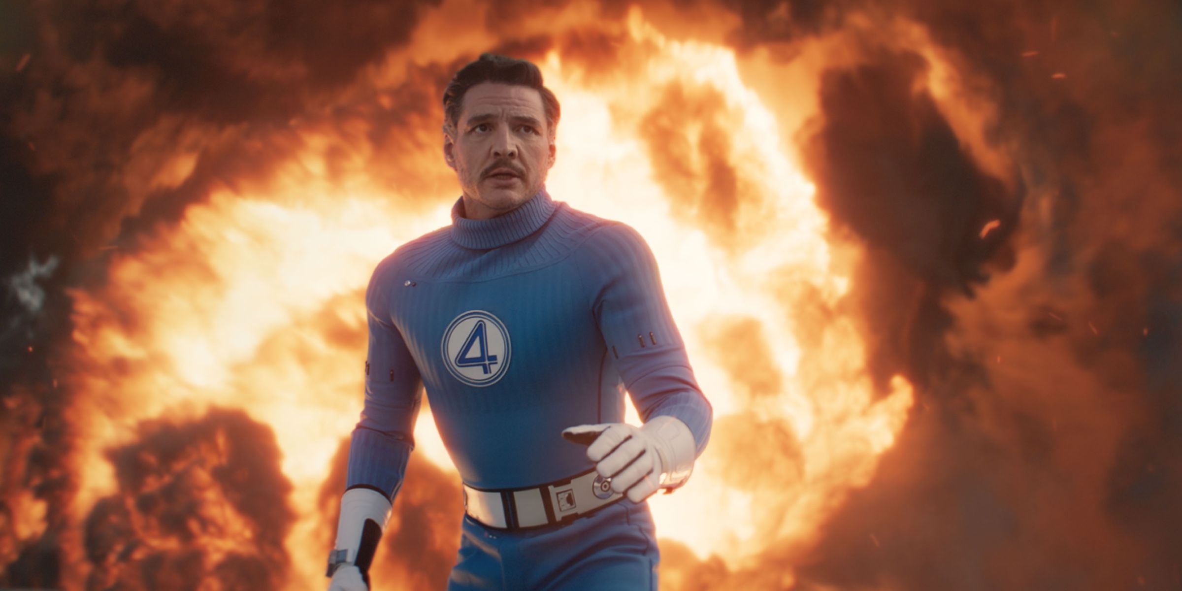 Pedro Pascal As Reed Richards aka Mister Fantastic In Front Of An Explosion In The Fantastic Four First Steps