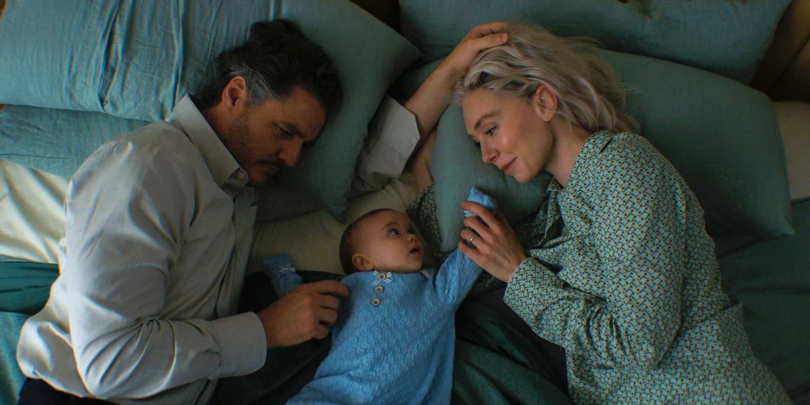 Pedro Pascal As Reed Richards, Franklin Richards and Vanessa Kirby As Sue Storm Laying In Bed In The Fantastic Four First Steps