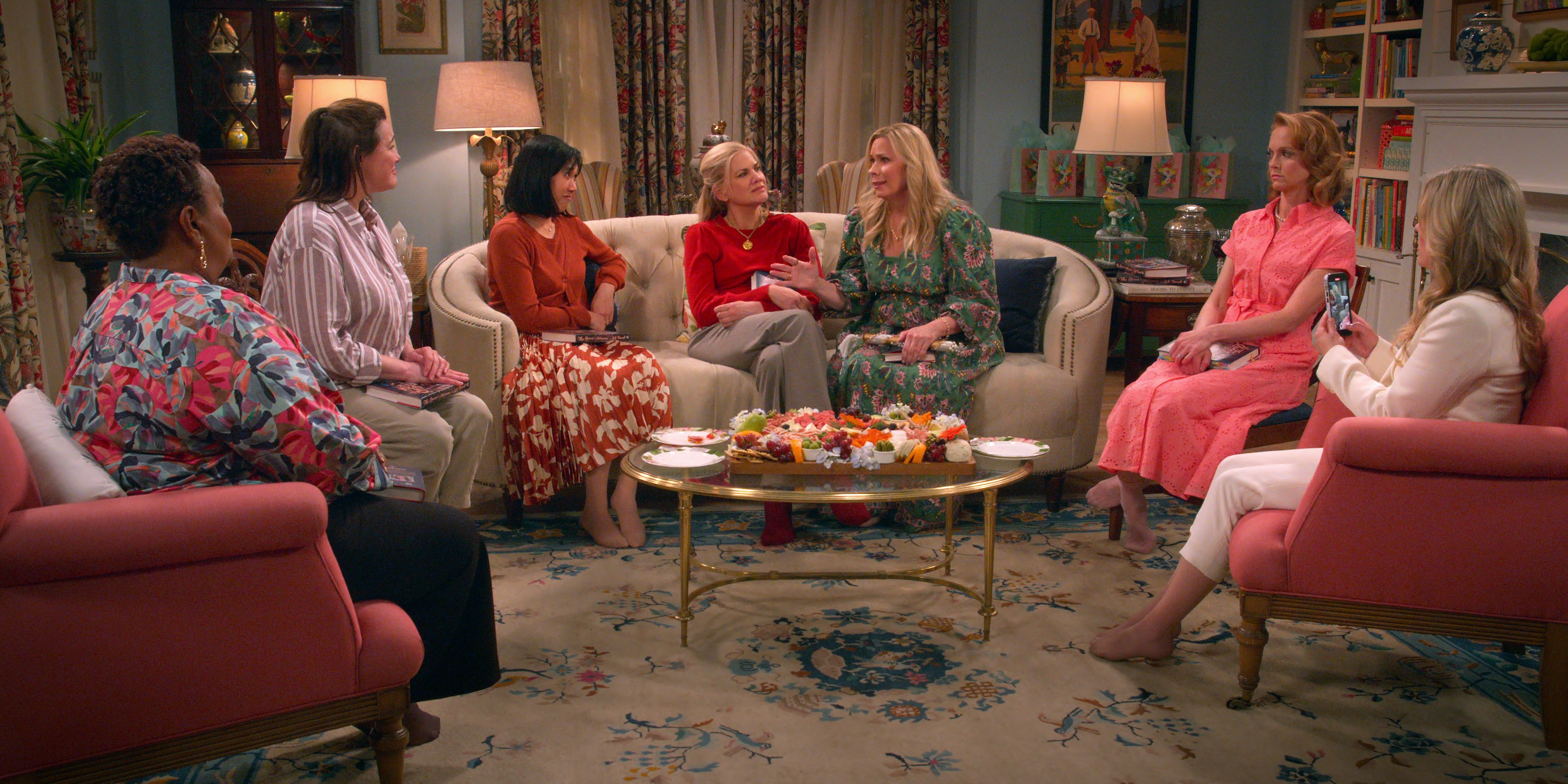 People sitting in living room in Netflix's Leanne