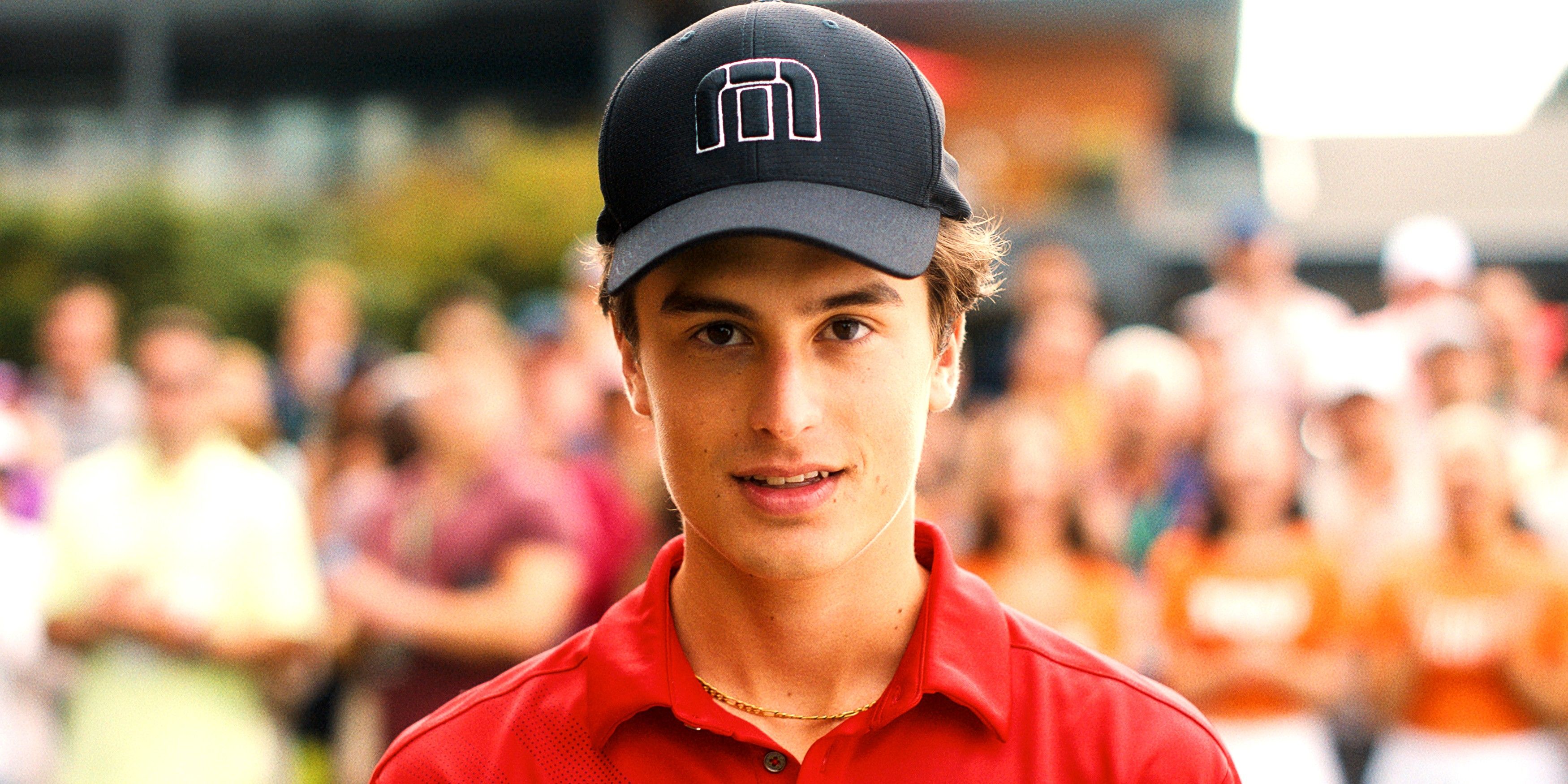 Peter Dager as Santi Wheeler slightly smiling at the golf course in Stick episode 9