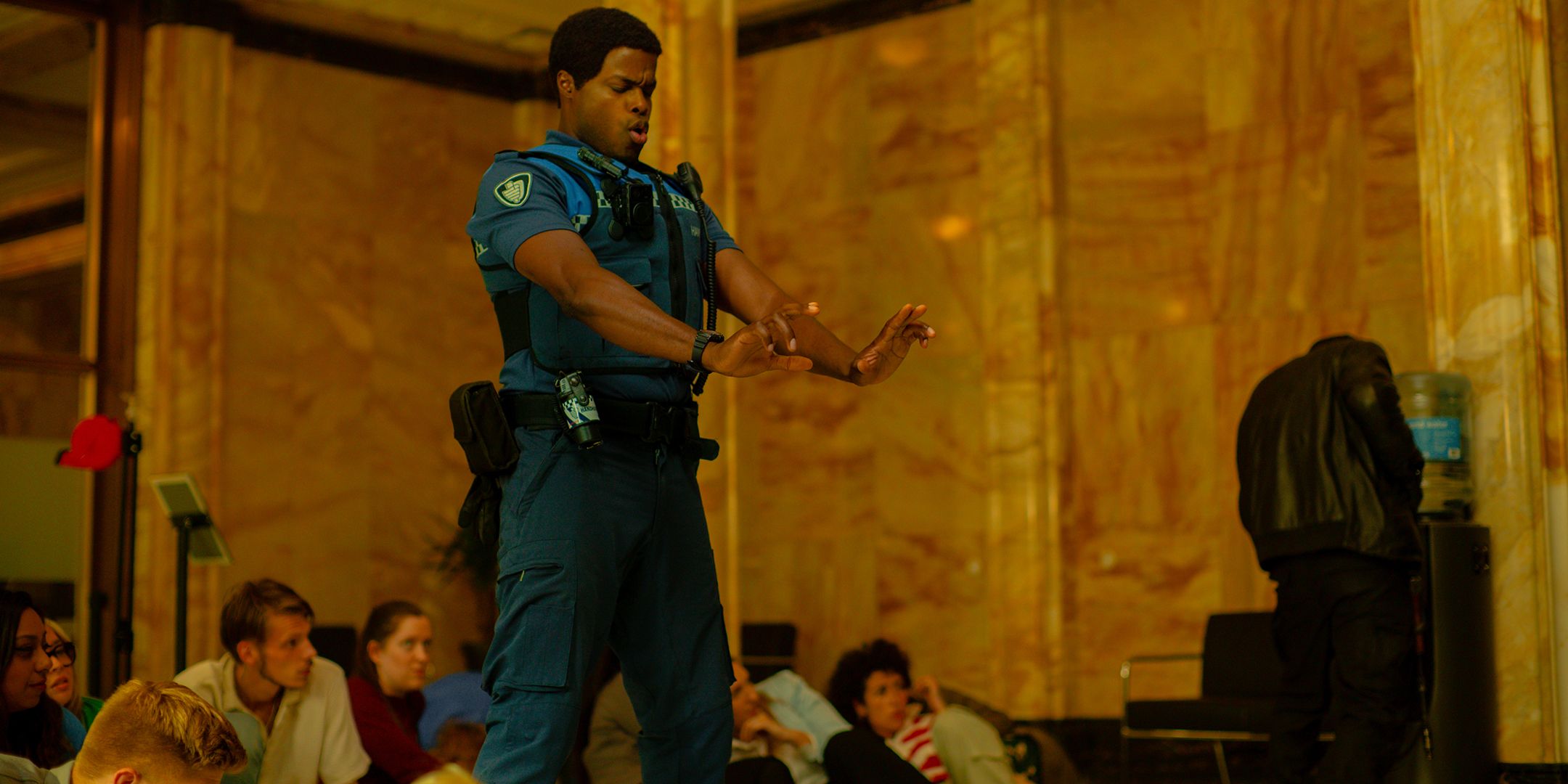 Ramon in a fighting stance during a bank robbery in Almost Cops
