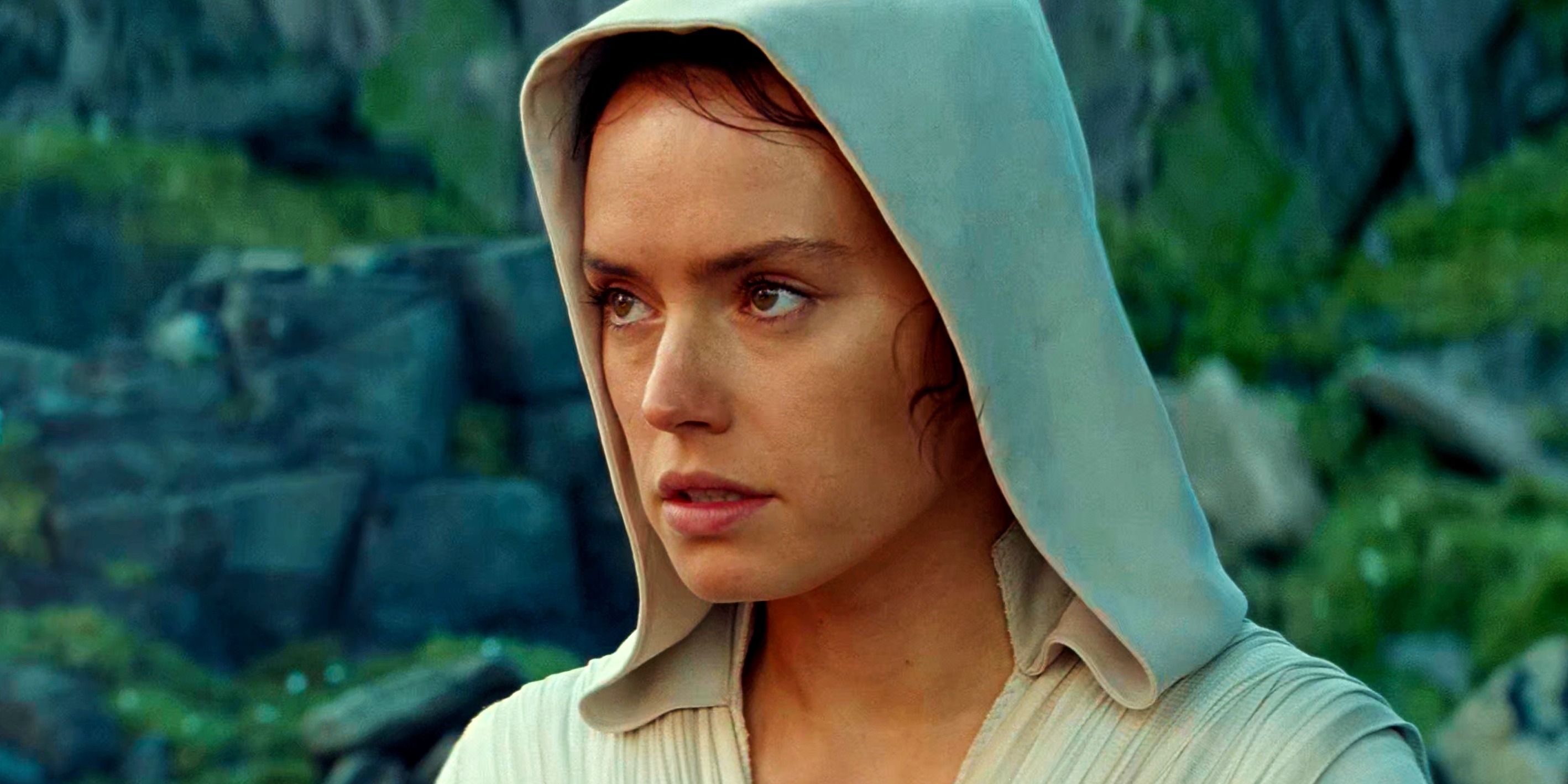 Rey in The Rise of Skywalker looking out from under her hood