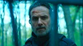 Rick Grimes looking through a fence with a wound on his head in The Walking Dead The Ones Who Live episode 6