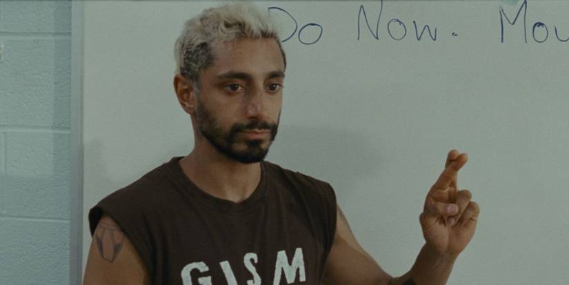 Riz Ahmed as Ruben signing in Sound of Metal