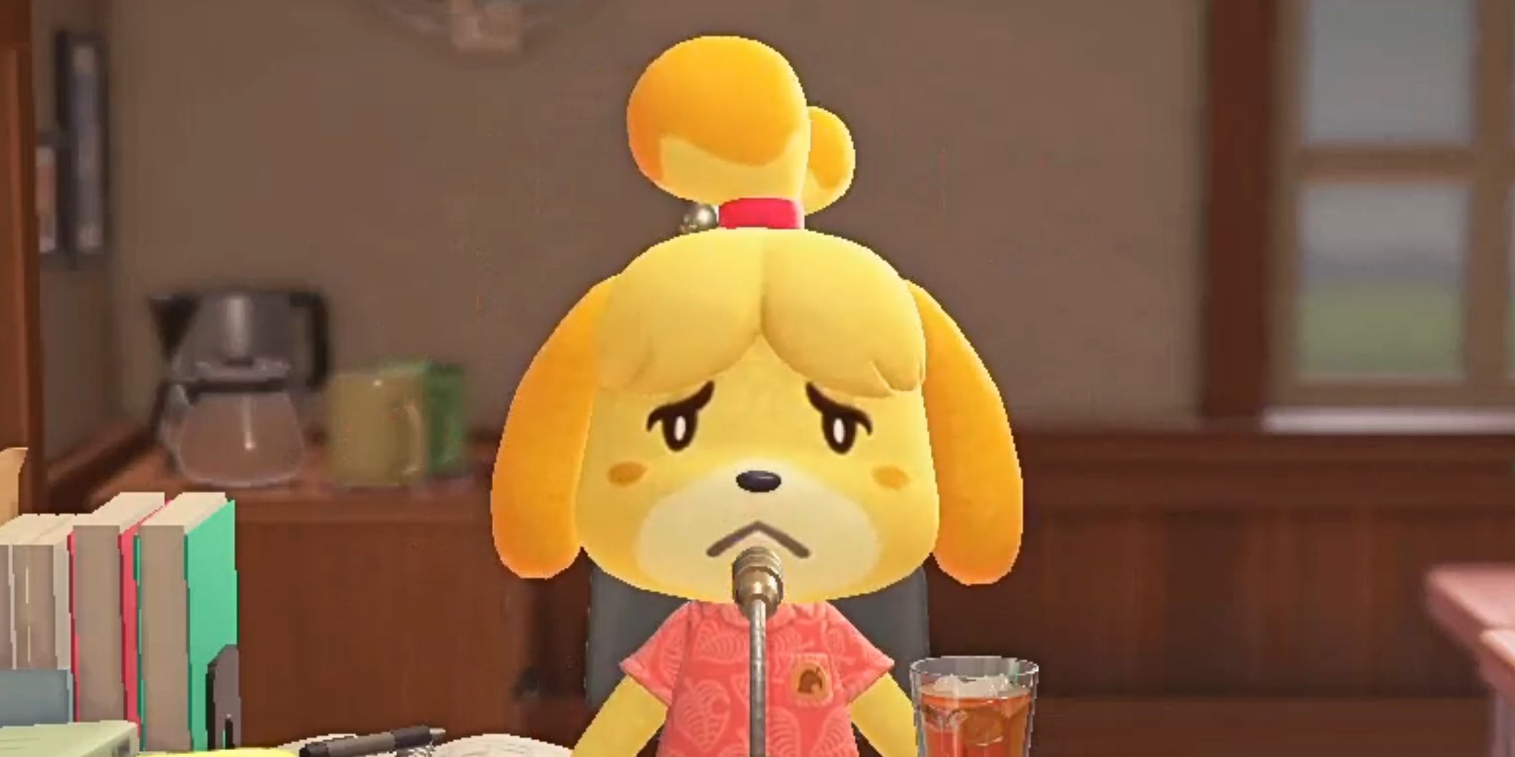 Sad Isabelle em sua mesa em Animal cruzando novos horizontes.