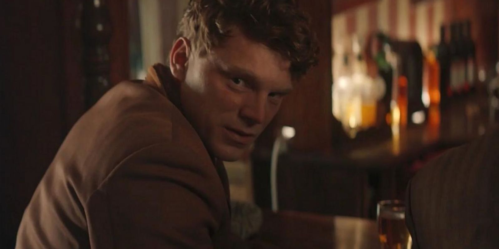 Scott Rose-Marsh looking over his shoulder in Krays: Code of Silence