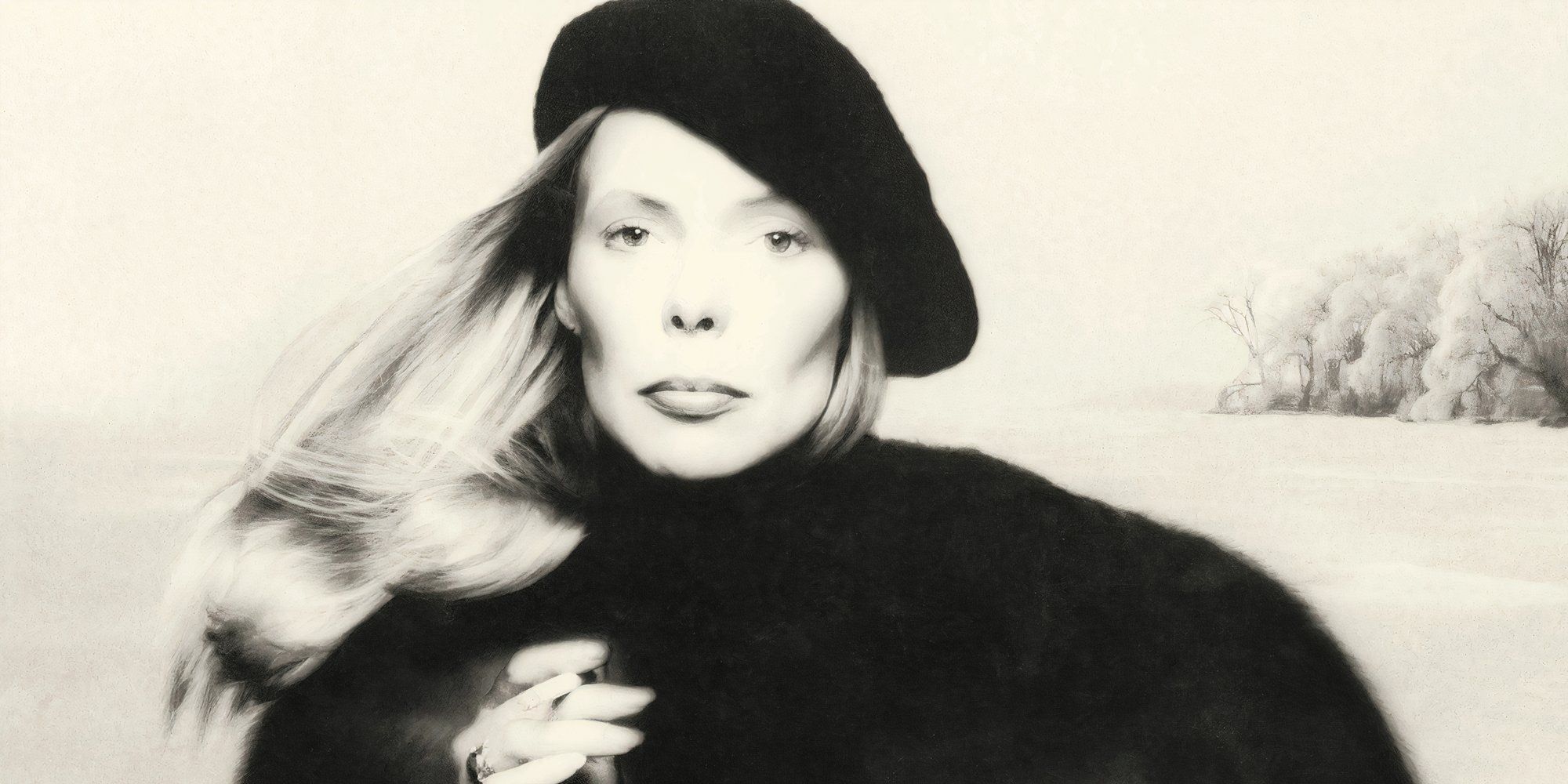 Joni Mitchell wears a black beret and jacket on the black and white cover of her Hejira album.
