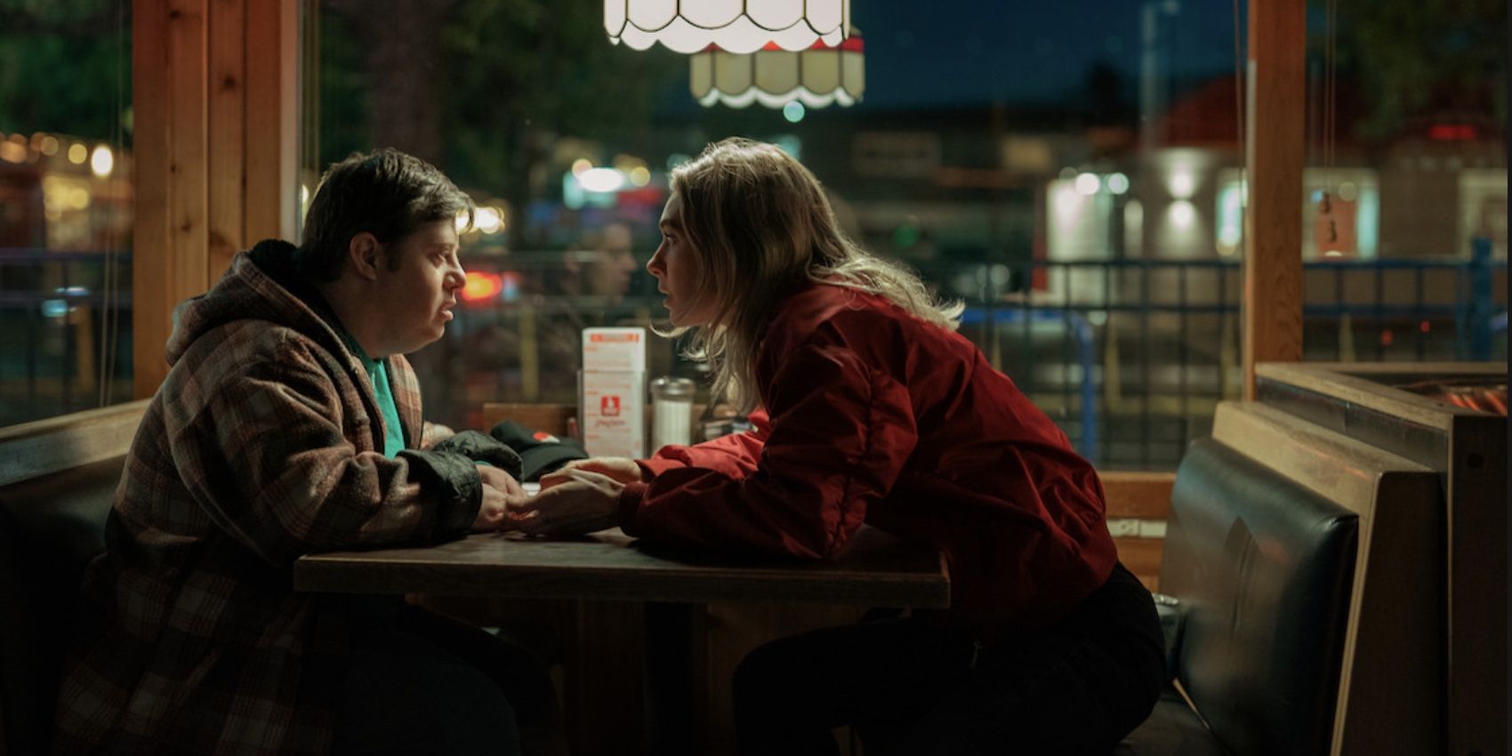 Zack Gottsagen and Vanessa Kirby at a diner in Night Always Comes