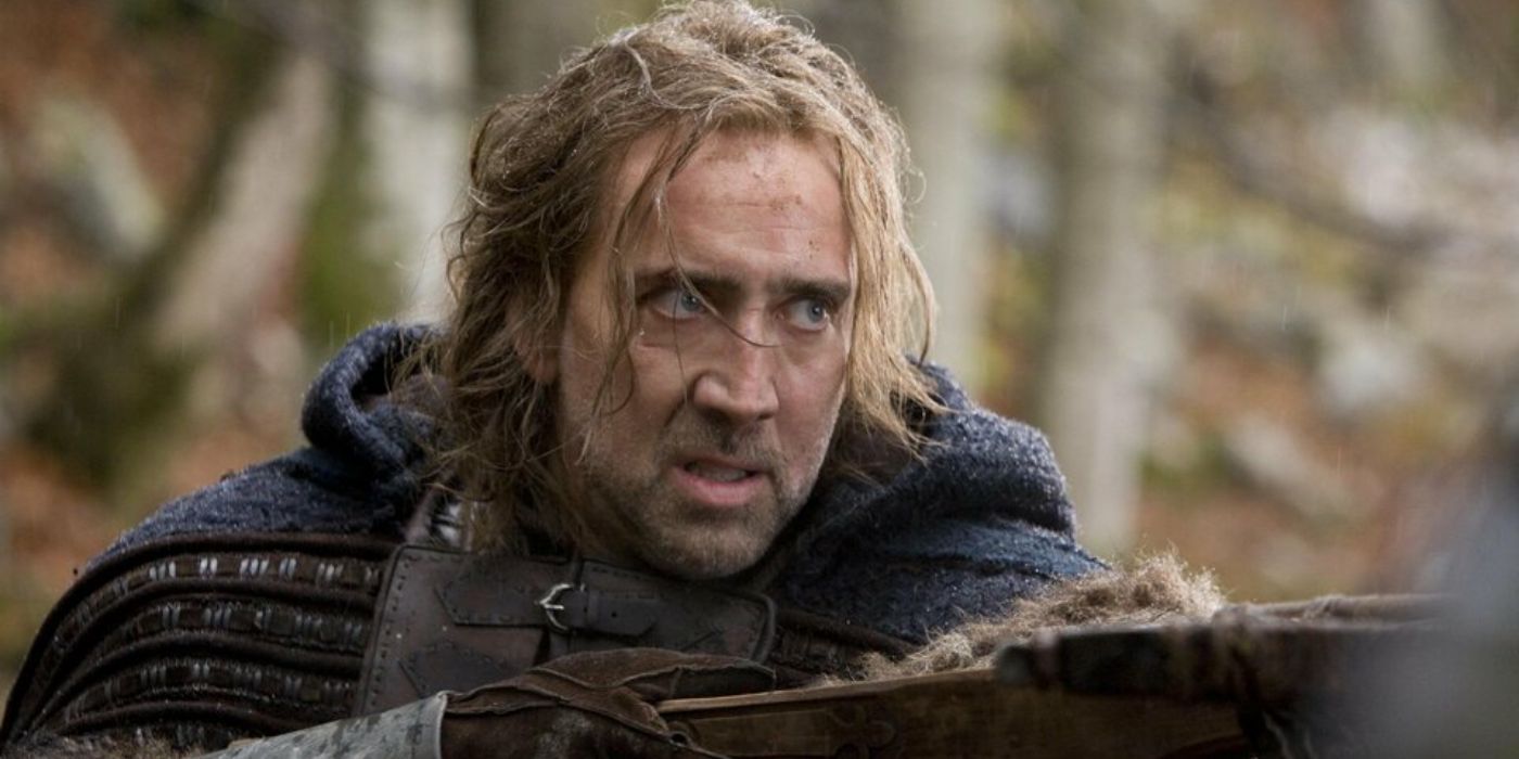 Nic Cage looks angry while holding a crossbow in Season of the Witch