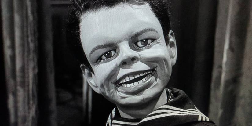 The Dummy The Twilight Zone puppet doll smiling in black and white