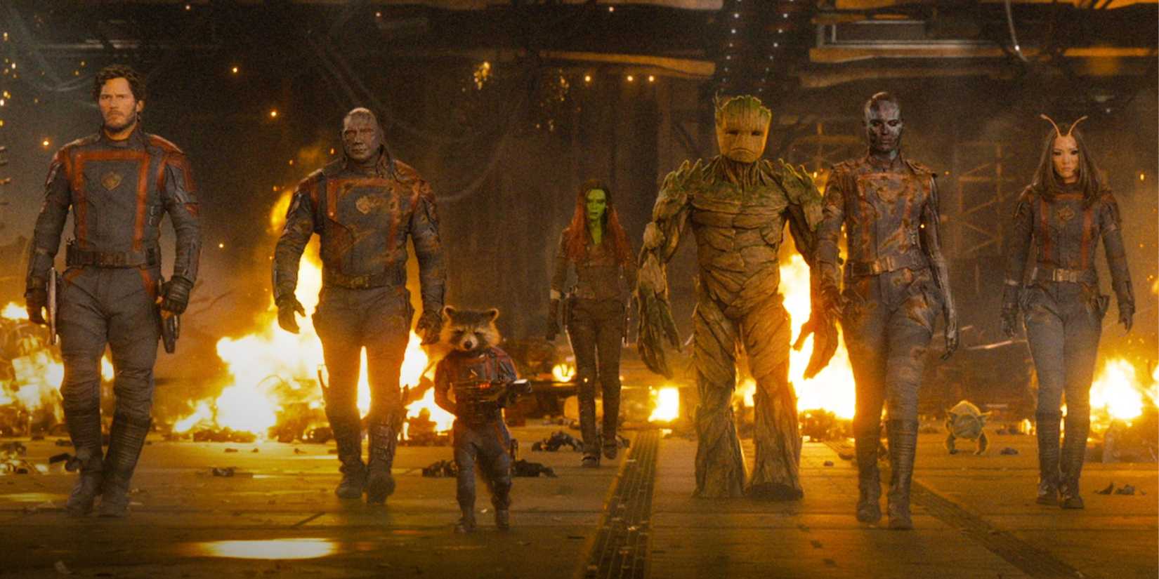 The Guardians walk as a group in front of an explosion in Guardians of the Galaxy Vol. 3 (2023)