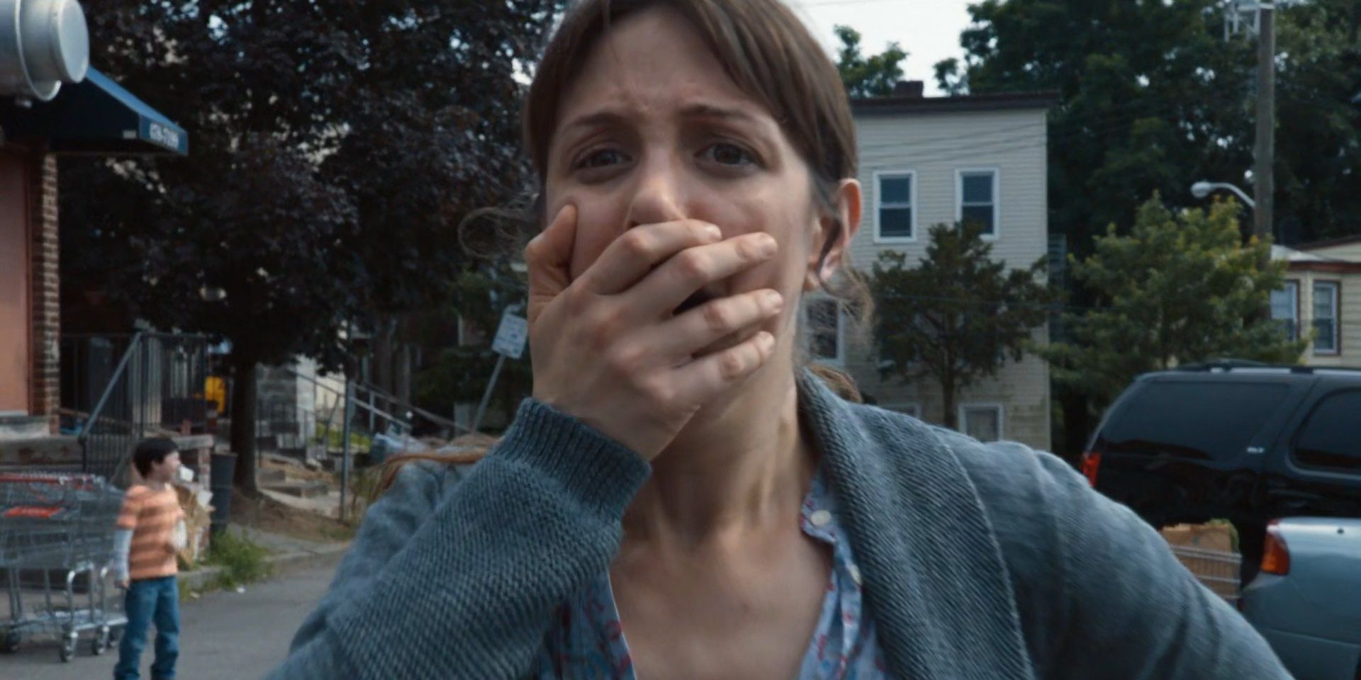 A mother gasping in horror in the opening scene of The Leftovers
