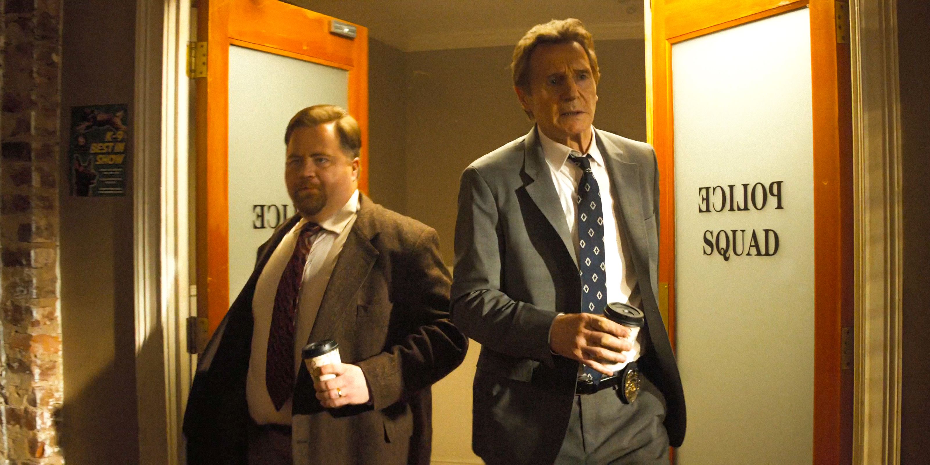 Paul Walter Hauser's character and Frank Drebin Jr. (Liam Neeson) trying to make an epic entrance in The Naked Gun (2025)