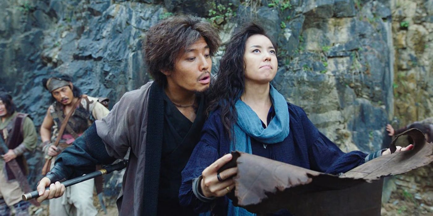 Two pirates consult a map in The Pirates: Last Royal Treasure