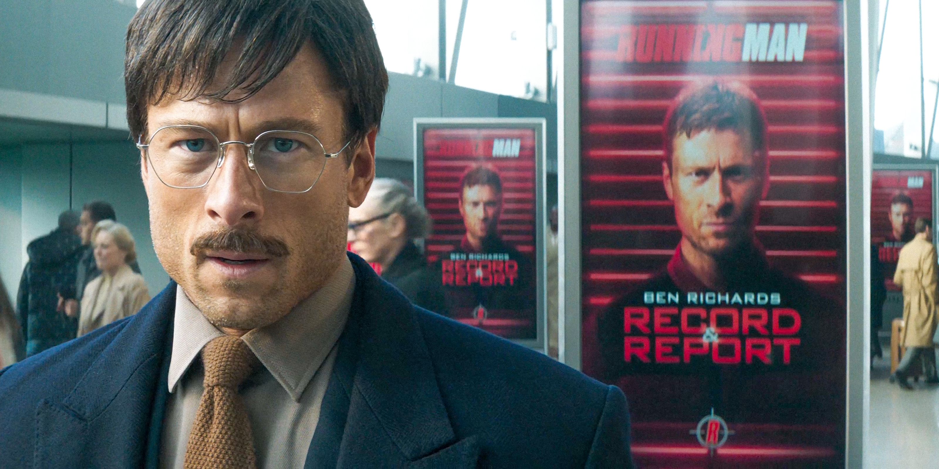 Ben Richards (Glen Powell) in disguise, with a poster of his face behind him in The Running Man (2025)