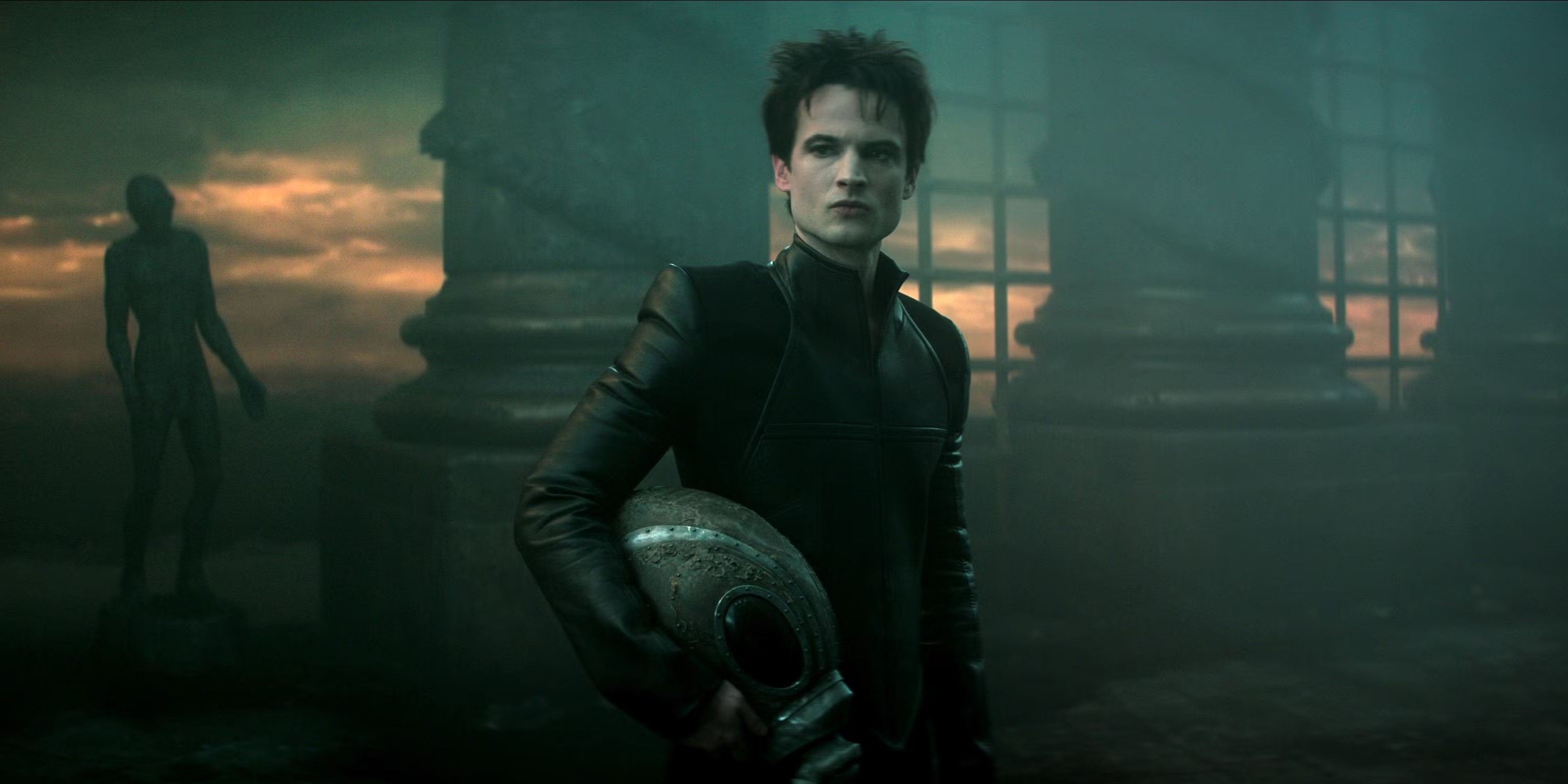 Dream (Tom Sturridge) holding a helmet in The Sandman Season 2 Vol 1_1