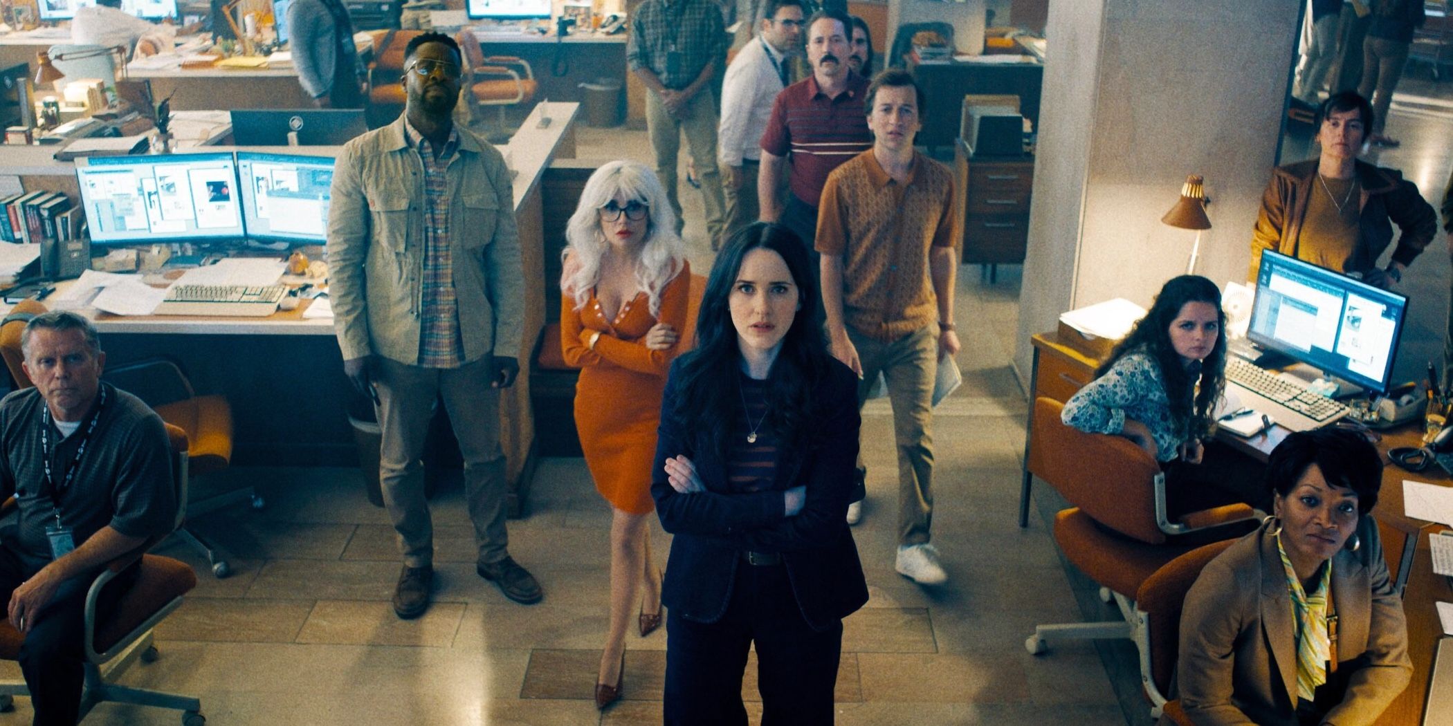 The Staff Of The Daily Planet All Looking Up Toward The Camera In Superman