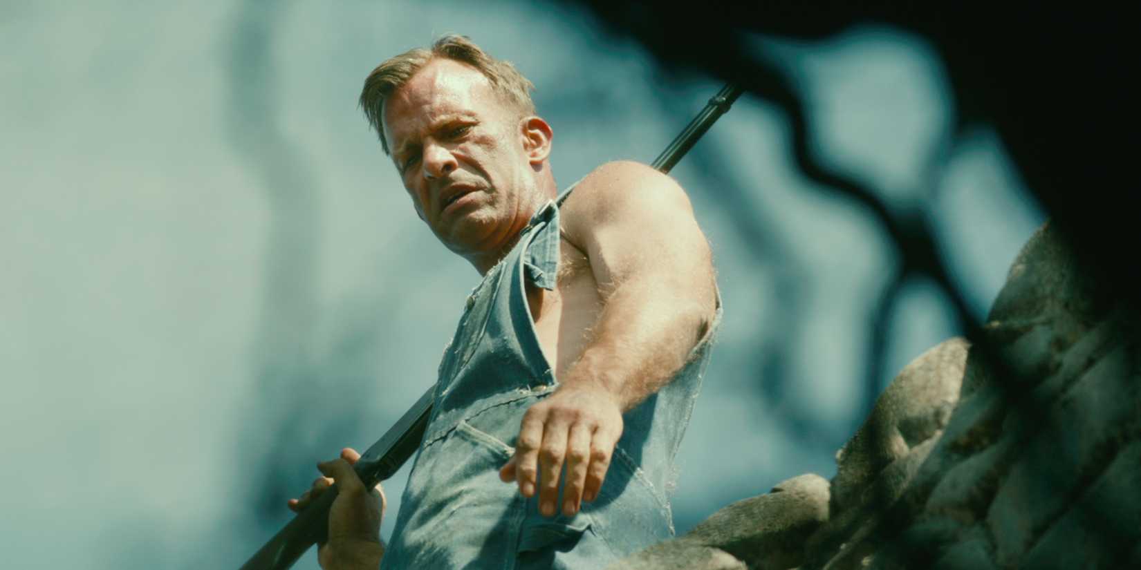 Thomas Jane as Will looking into the well in 1922
