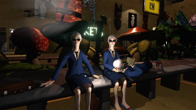 Three people in costumes sitting on a all-terrain bench