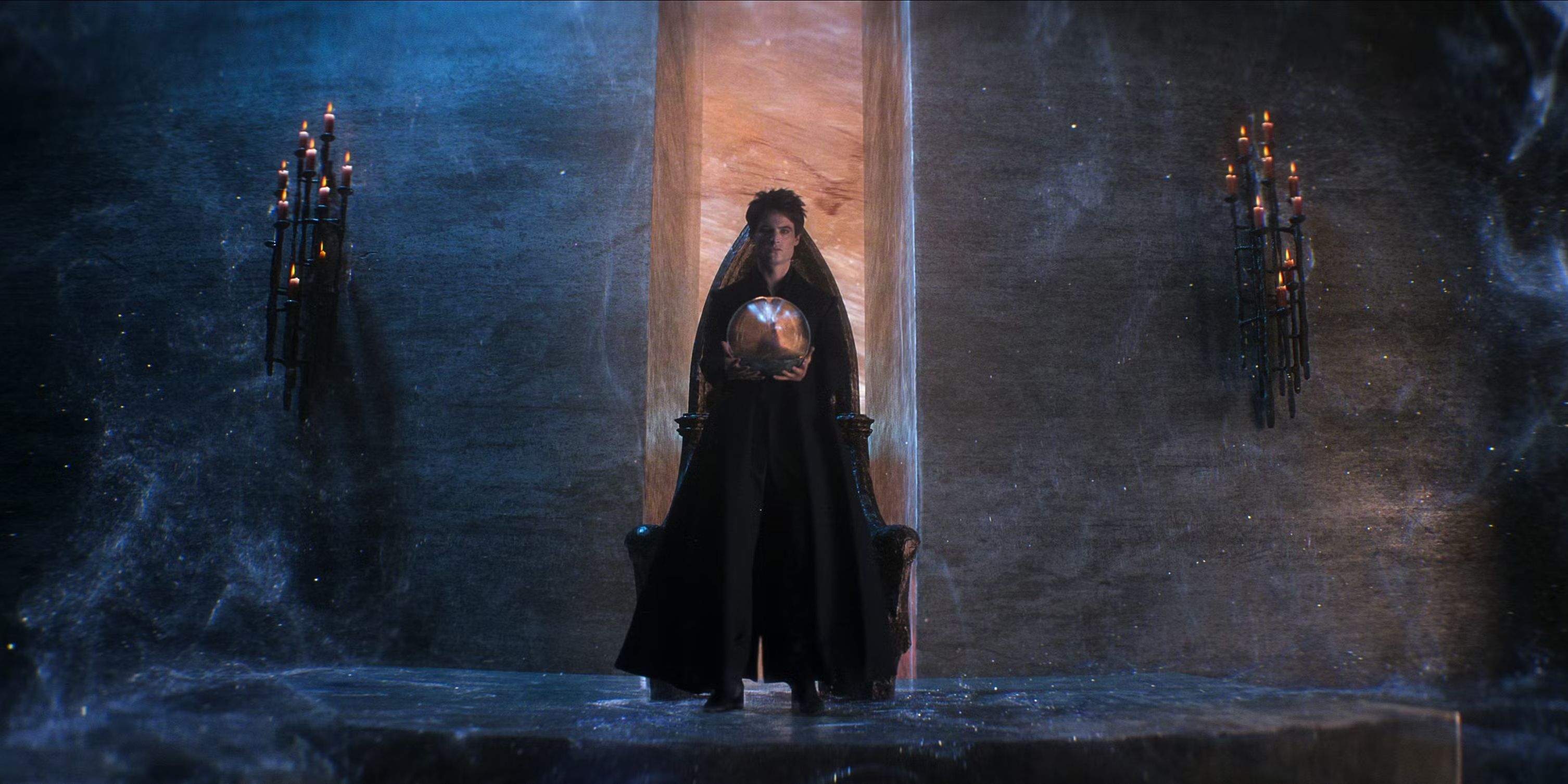 Tom Sturridge as Dream holds a silvery orb in The Sandman season 2 copy