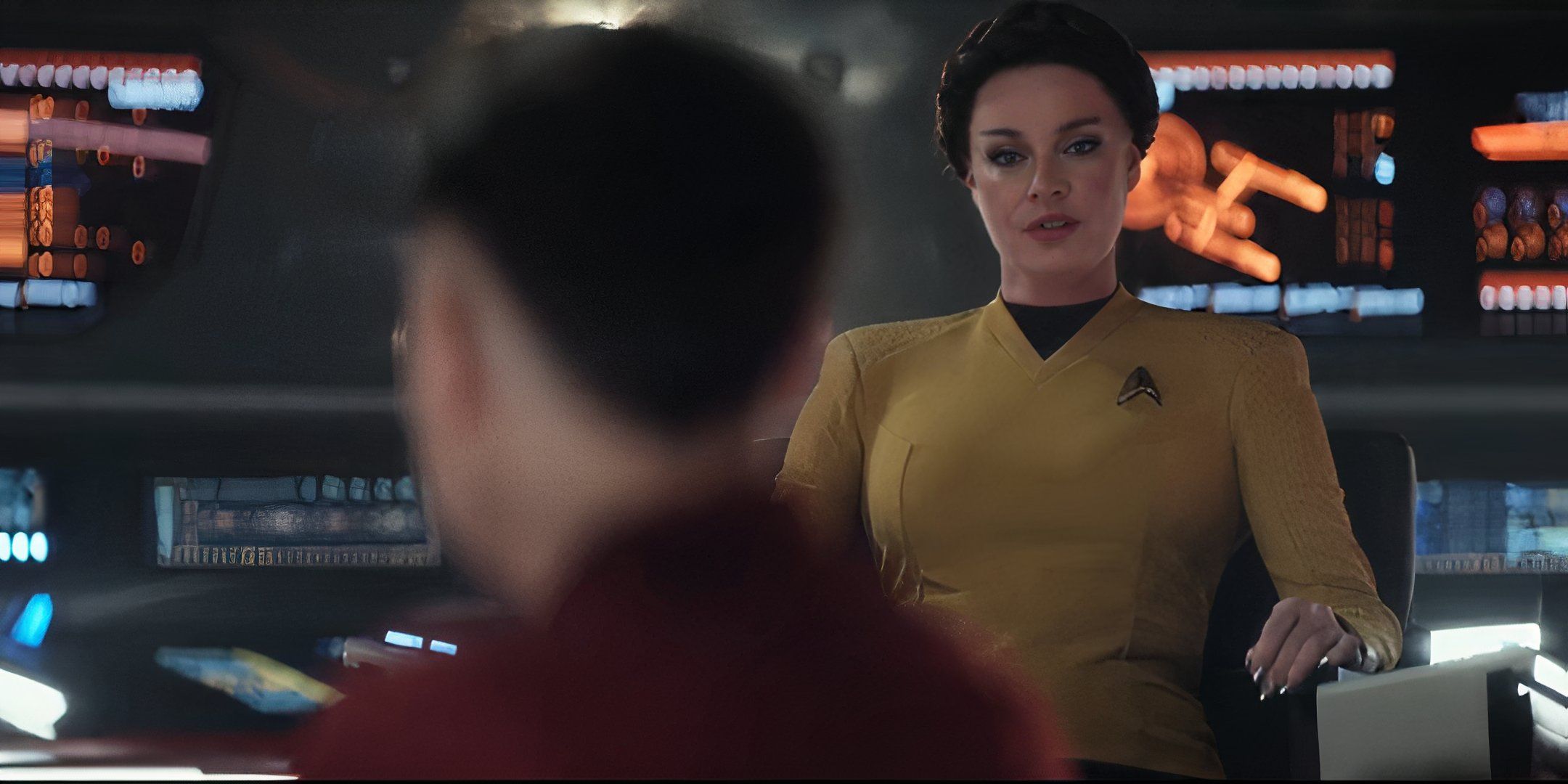 Una Chin-Riley (Rebecca Romijn) in the captains chair in Strange New Worlds Shuttle to Kenfori