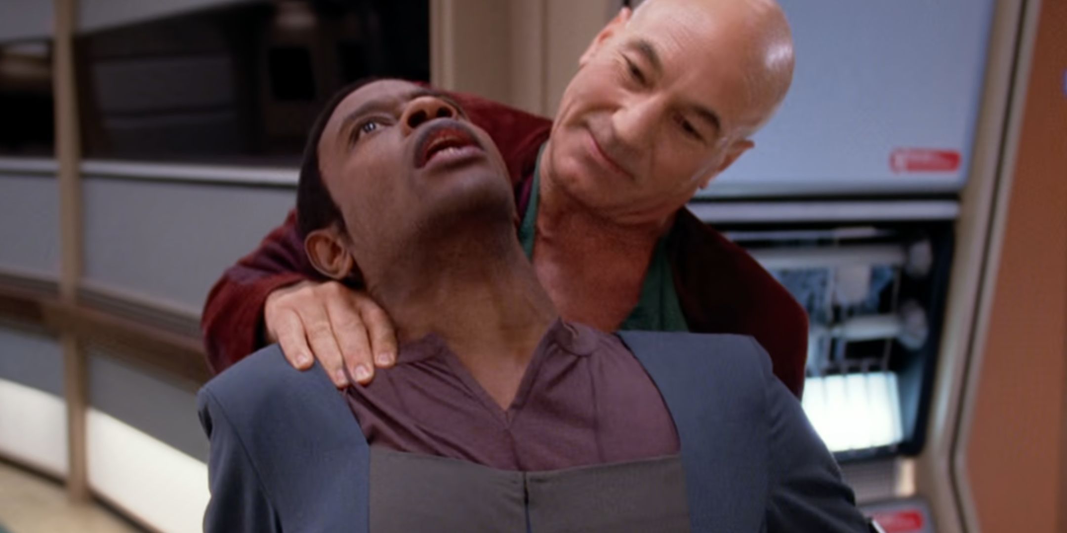 Patrick Stewart as Captain Picard fighting with Tim Russ as Devor in Star Trek: The Next Generation