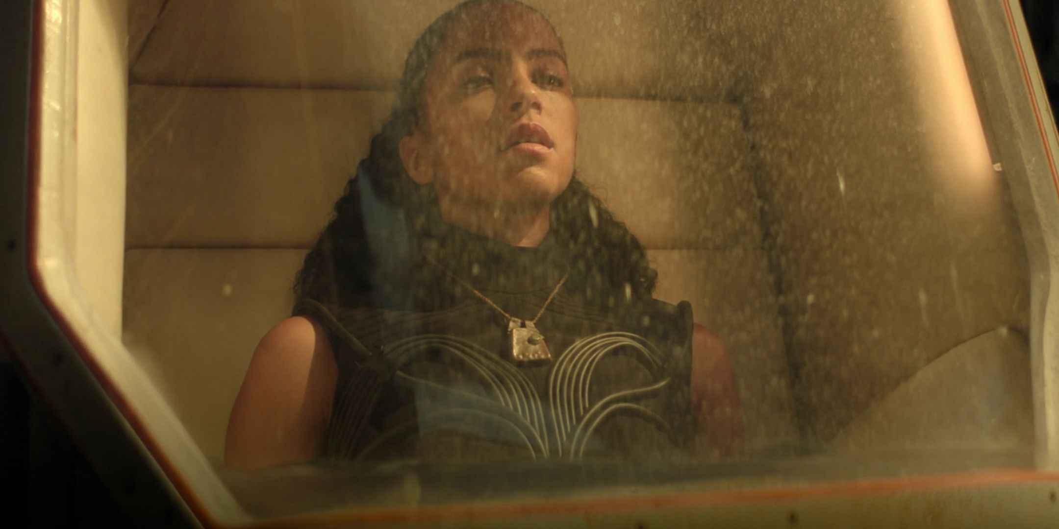 Lou Llobel in a statis chamber as Gaal Dornick in Foundation