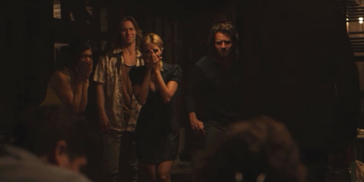 A group of people look shocked while looking on in Vile