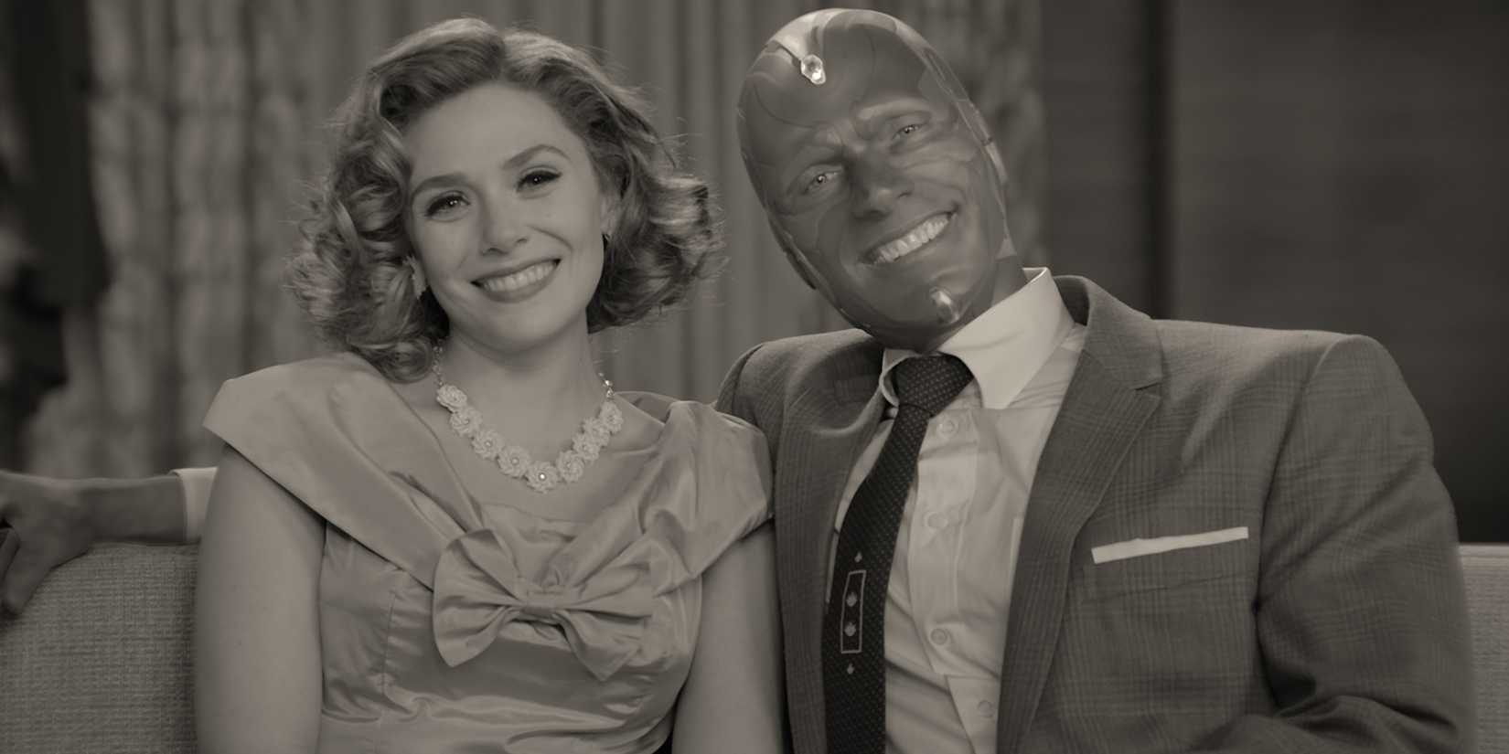Wanda and Vision smiling at the camera in WandaVision