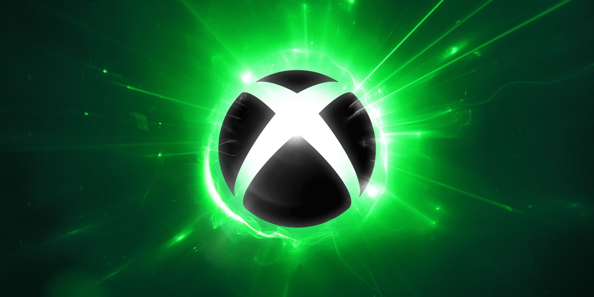 The Xbox logo is highlighted by green lights behind.