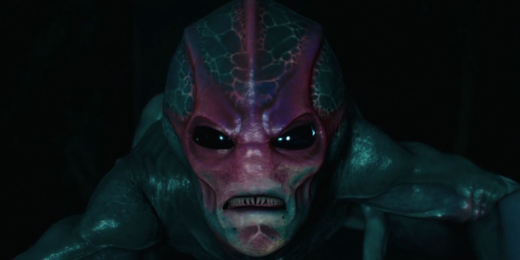 Harry looking angry in Resident Alien