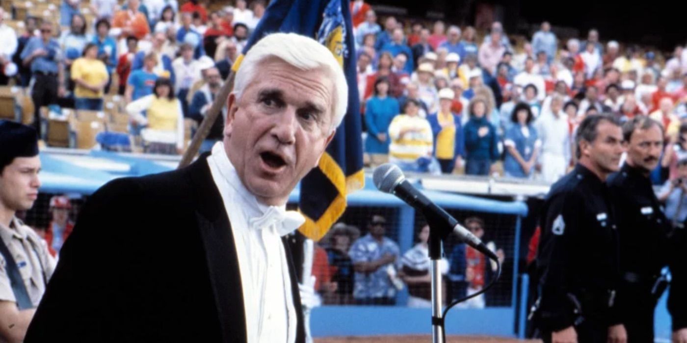 Leslie Nielsen singing at the baseball game in The Naked Gun