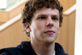 A close-up of Jesse Eisenberg looking smug in The Social Network