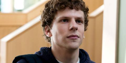 A close-up of Jesse Eisenberg looking smug in The Social Network