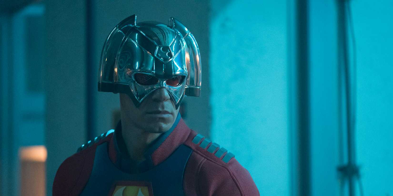 A close-up of John Cena's face in costume in Peacemaker