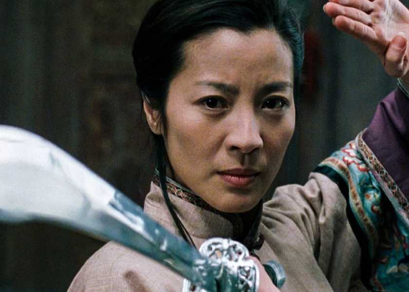 A fighter holding a sword in Crouching Tiger Hidden Dragon