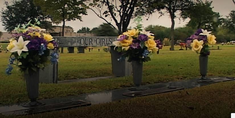 A memorial shows three flower bouquets and the phrase "Our Girls" on a plaque in HBO Max's The Yogurt Shop Murders