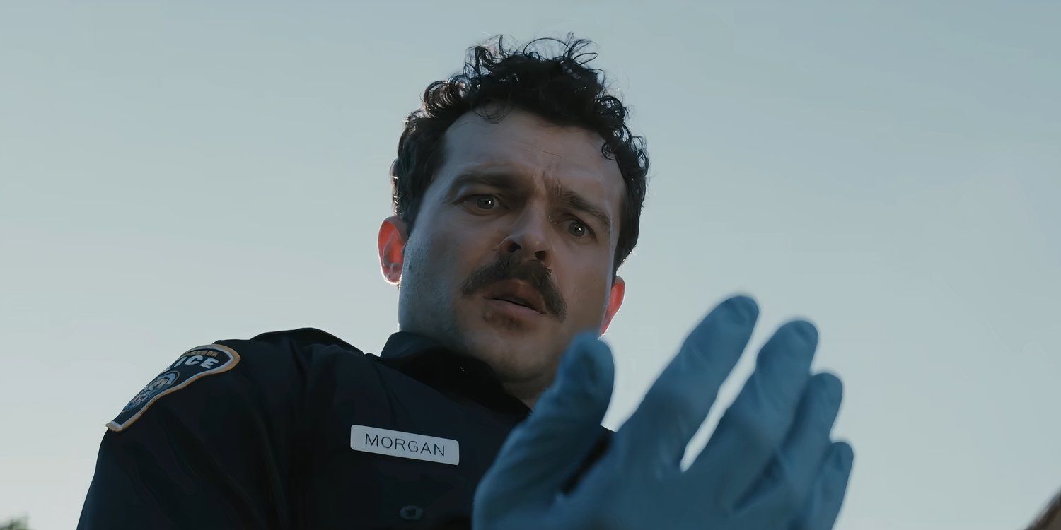 Alden Ehrenreich as Morgan looking down on his bloodied hand in the horror movie Weapons