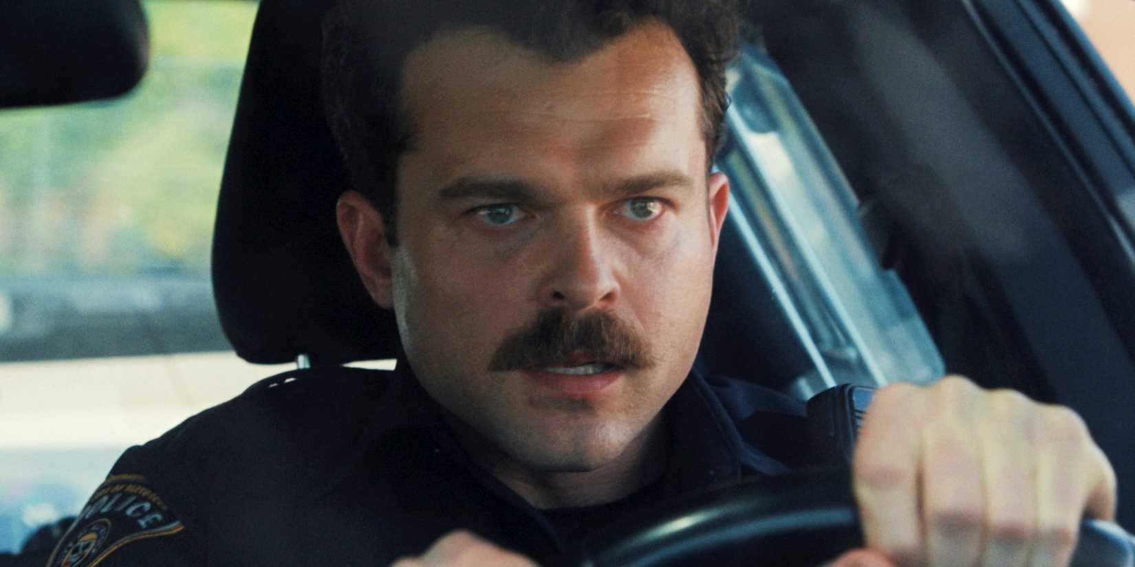 Alden Ehrenreich driving his cop car in Weapons