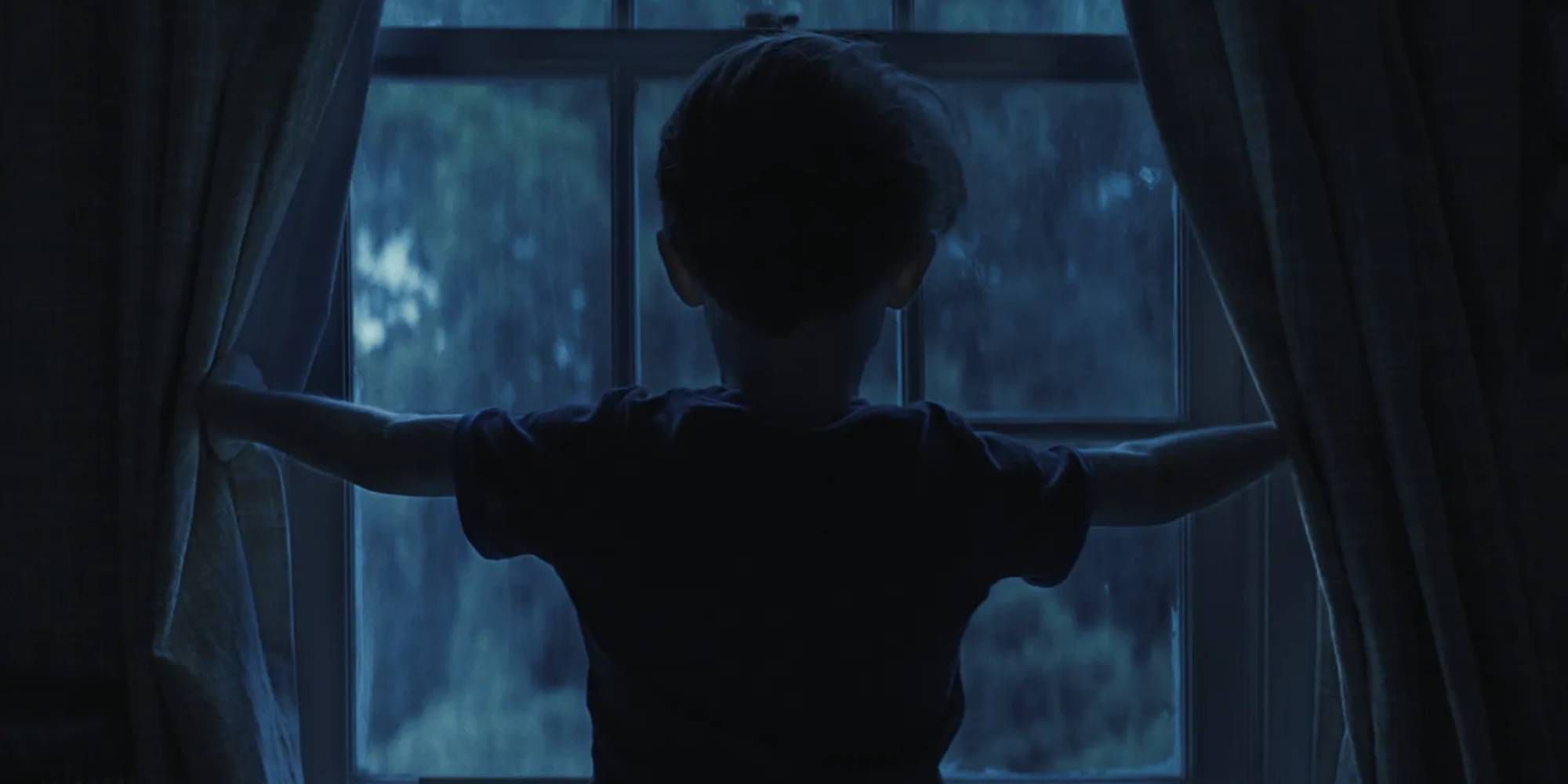 Alex looking out the window in Weapons
