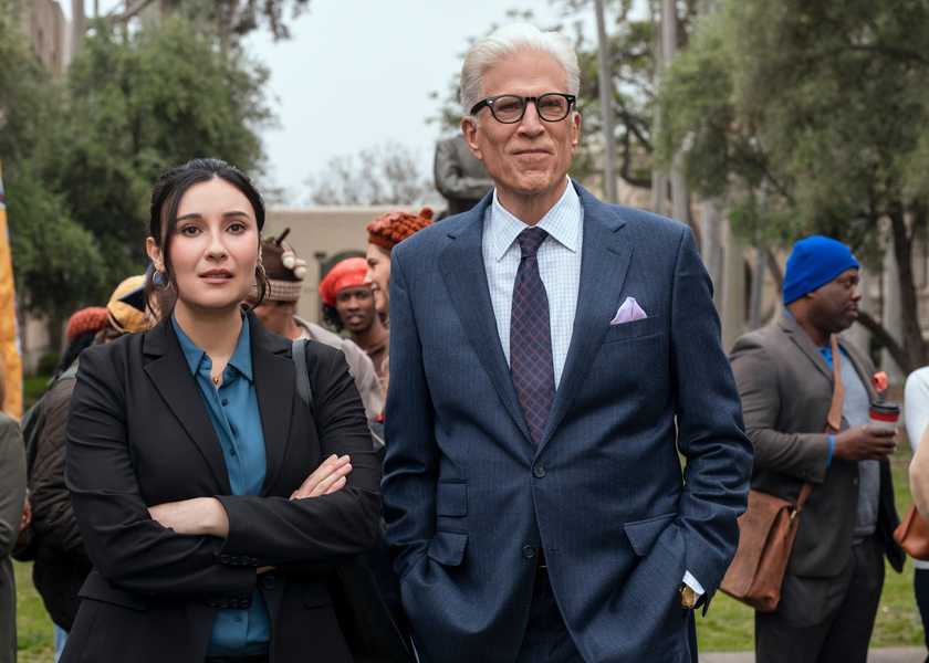Charles (Ted Danson) smiling while standing next to Julie (Lilah Richcreek Estrada) on a college campus in A Man on the Inside season 2