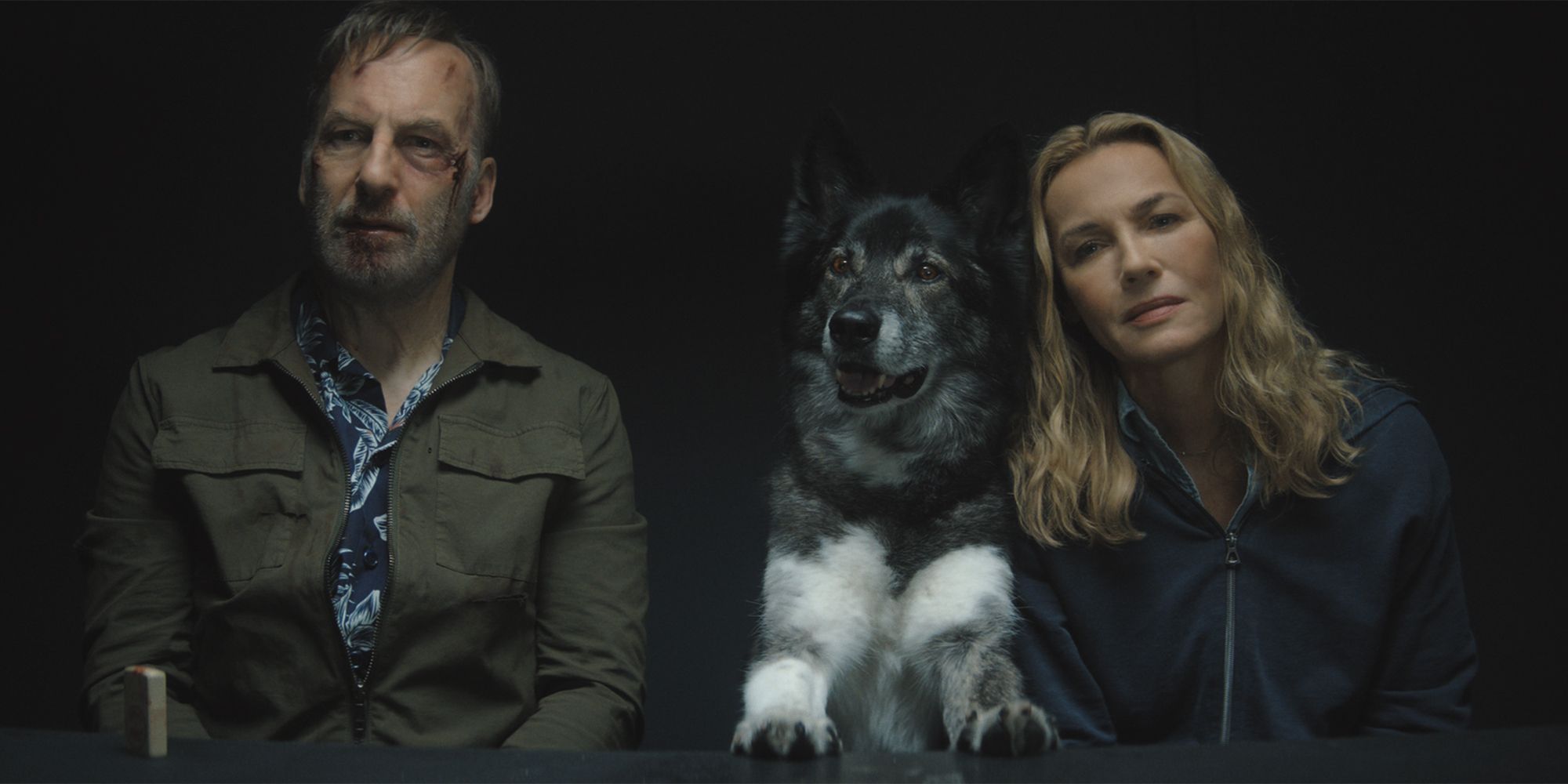 Bob Odenkirk & Connie Nielsen with dog in Nobody 2