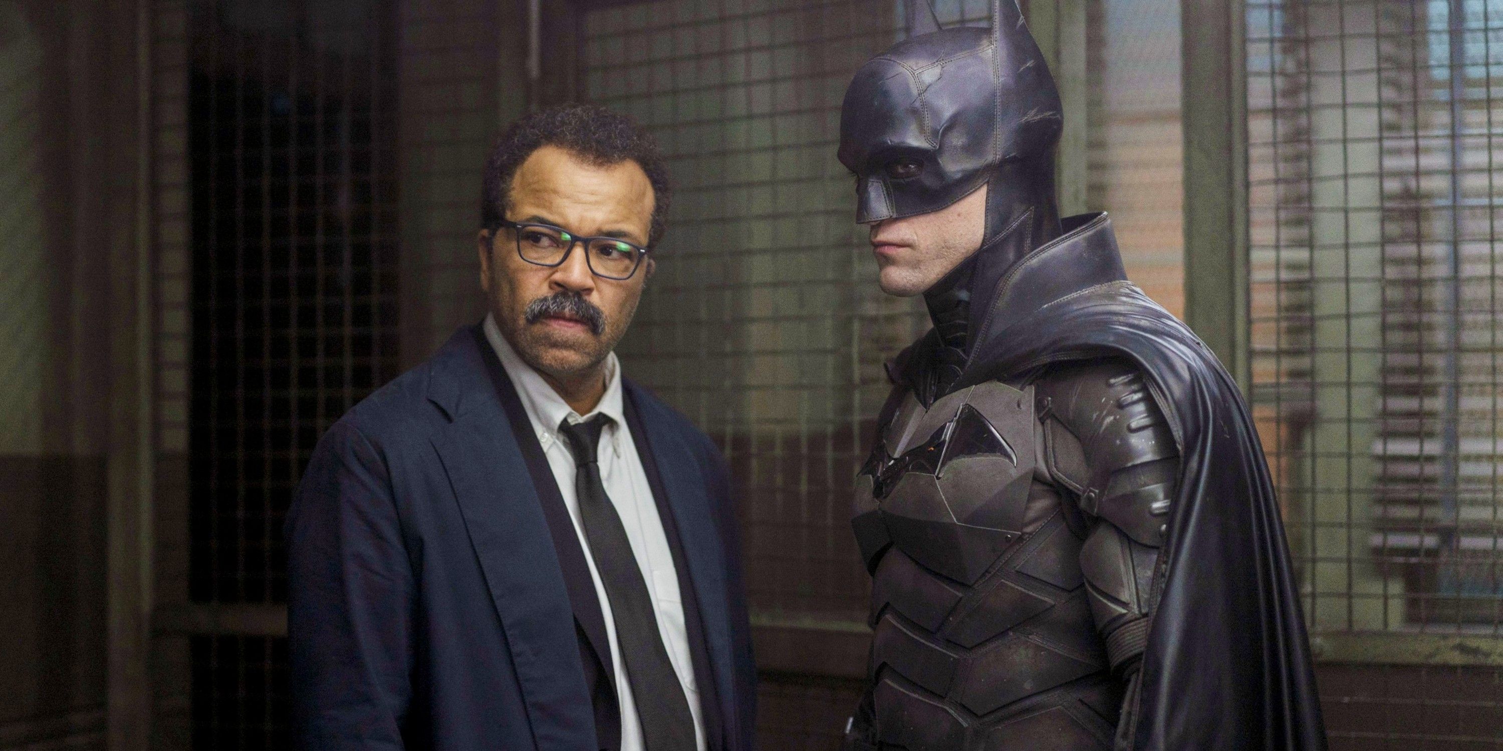 Bruce Wayne next to Commissioner Gordon in The Batman