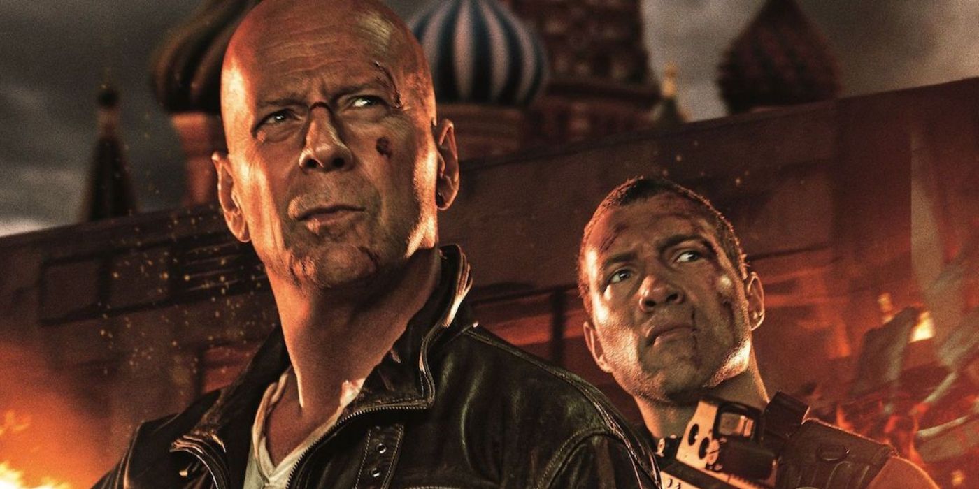 Bruce Willis and Jai Courtney stand in front of the Red Square in A Good Day to Die Hard