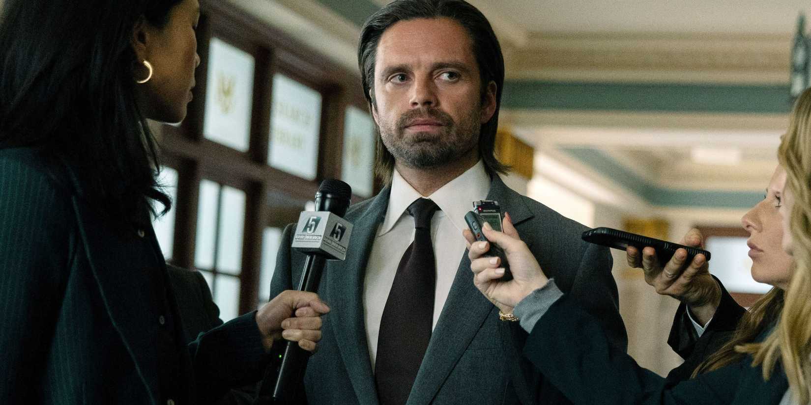 Bucky Barnes looking off-screen with microphones near him in Thunderbolts
