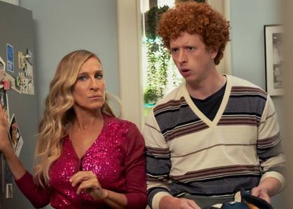 Carrie and Brady standing in Miranda's kitchen looking nervous in the And Just Like That season 3 finale