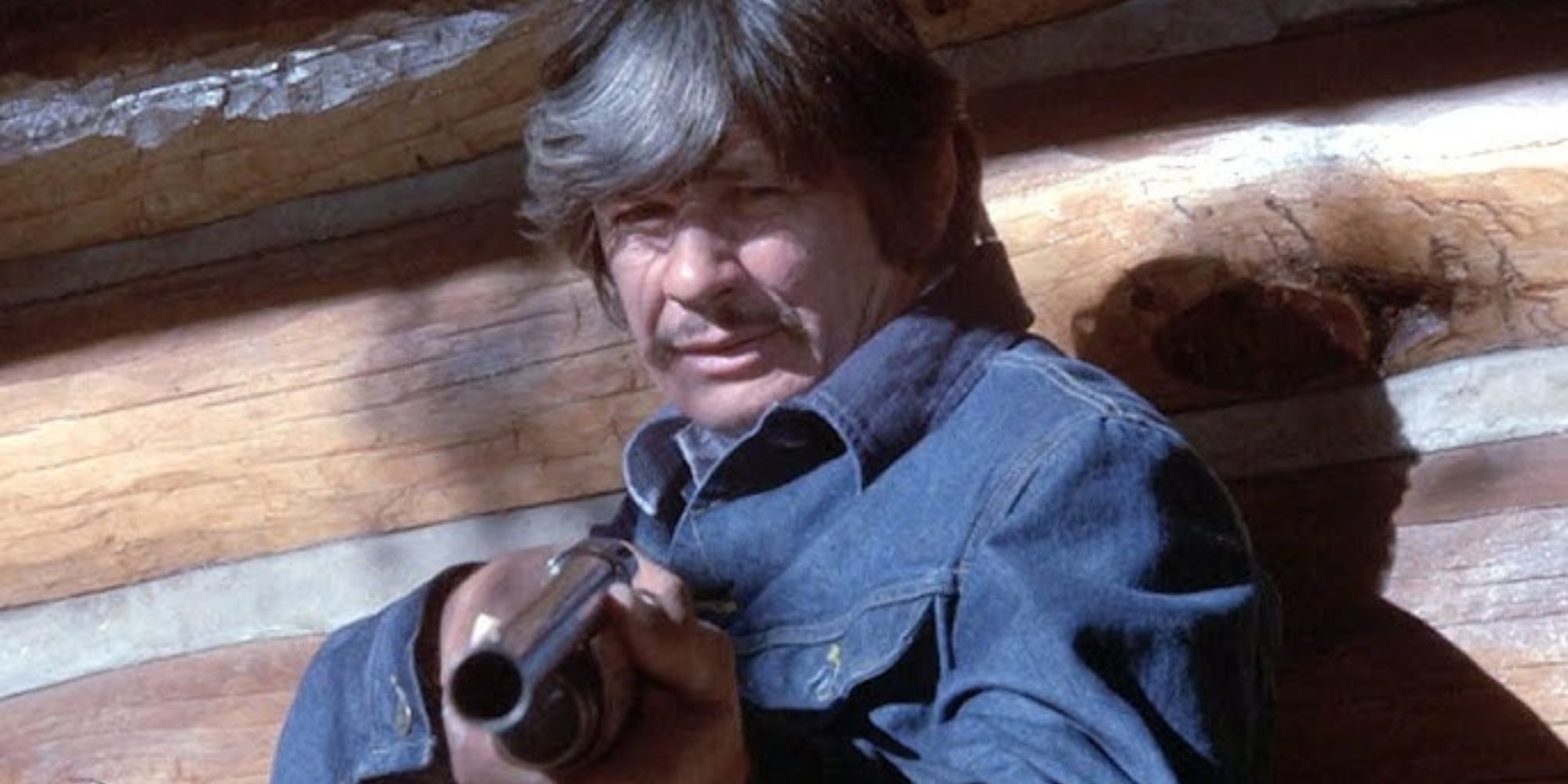Charles Bronson as Mr Majestyk with a gun